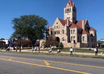 ProLife Life Chain Several people on a street holding signs in front of a church