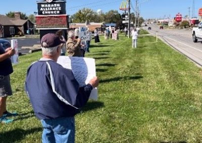 ProLife Life Chain Several people on a street holding sign