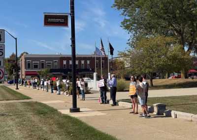 ProLife Life Chain Several people on a street holding sign