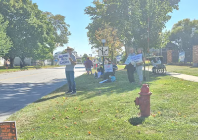ProLife Life Chain Several people on a street holding sign