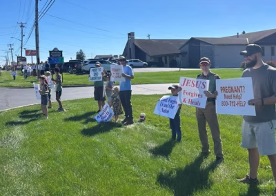 Life Chain people holding proLife signs